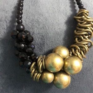 Art for your neck! Brass and faceted bead necklace.